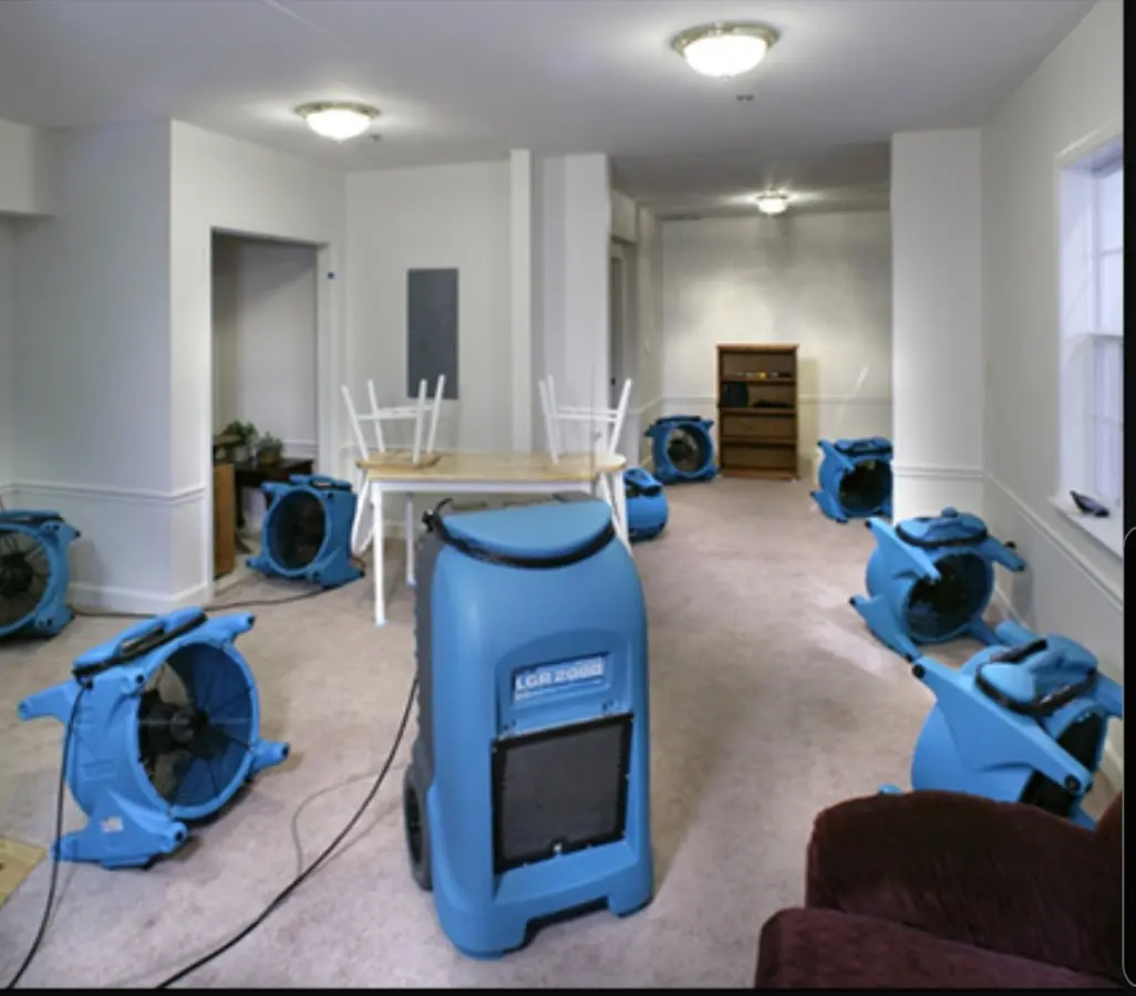 Air movers and dehumidifier setup for Water Extraction & Removal in Turner